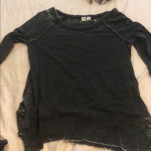 Gray long sleeved top.